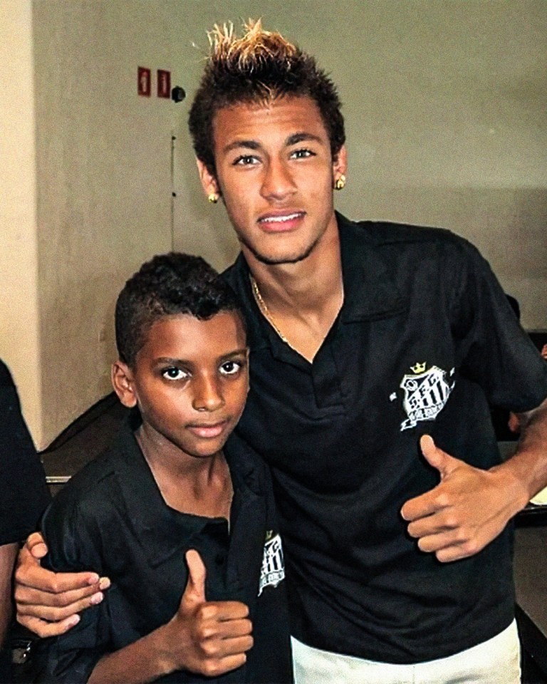 Neymar poses with the mystery pre-teen future Real Madrid and Brazil superstar