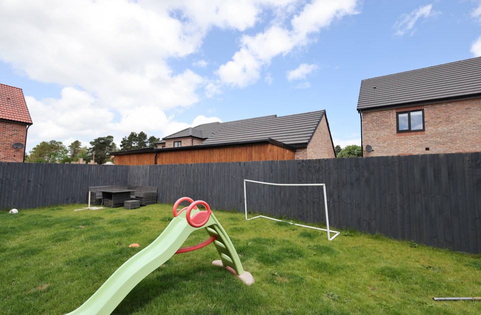 One of the sheds can be seen over the fence from Michael and Nicola's garden