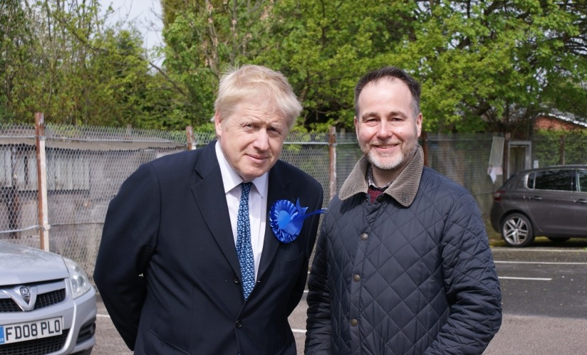 Pincher pictured previously with Boris Johnson