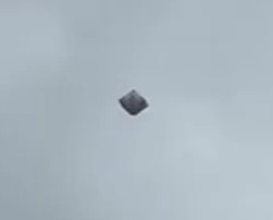 It appears to be shaped like a cube or diamond