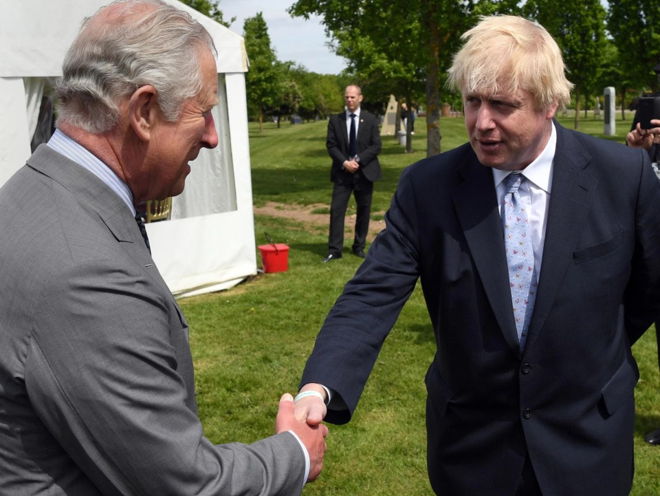 Prince Charles is due to fly out to Africa and he will now likely be quizzed by reporters over the Rwanda plans – pictured with Boris Johnson