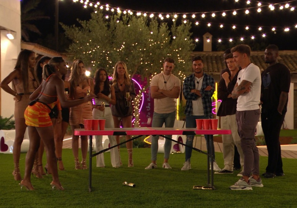 The Love Island stars play a game of beer pong in tonight's episode