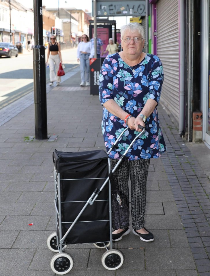 Jacky Sivell keeps her purse in her shopping trolley to avoid being mugged