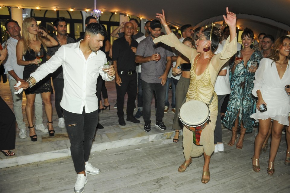 Aguero, drink in hand, wasn't afraid to dance