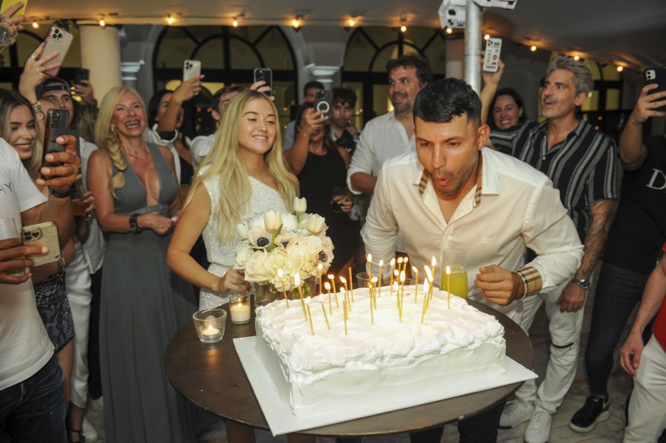 Aguero was treated to a big cake and had a massive grin on his face when presented with it