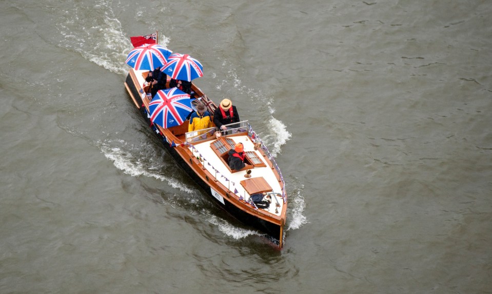 Spectators still flocked to the Thames in 2012 despite the bad weather