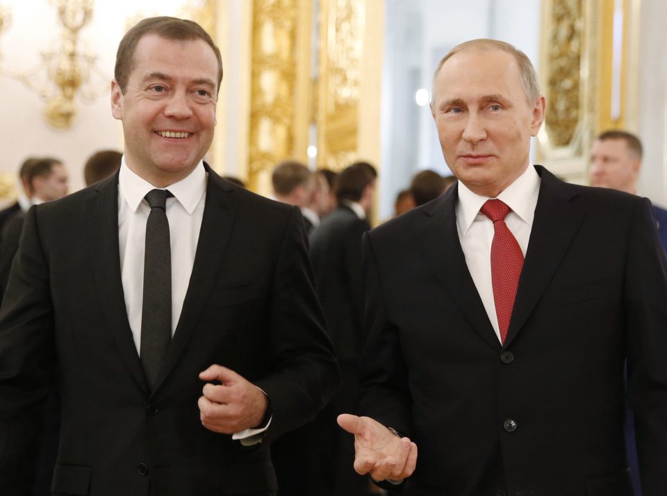 Putin's pal Dmitry Medvedev, left, has issued a chilling warning to the West