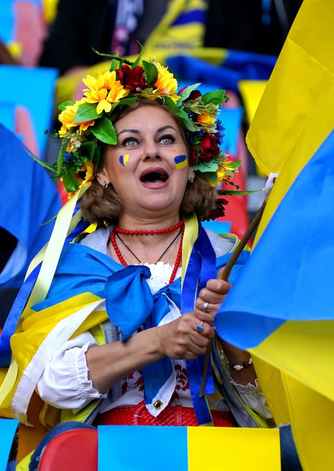 A Ukrainian fan in Hampden Park shows her pride