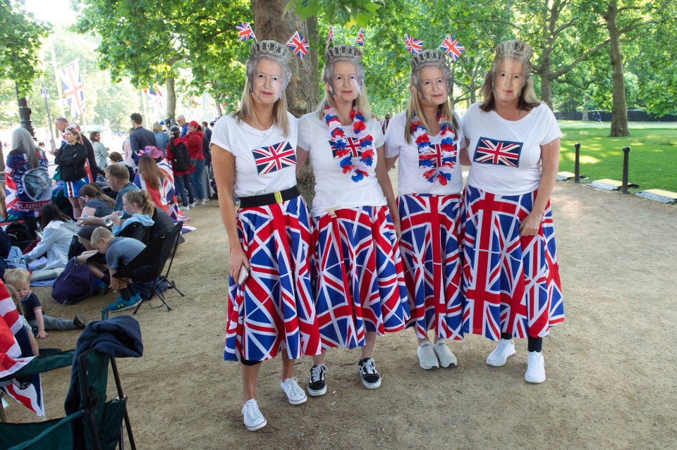 Four friends dressed for the royal occasion