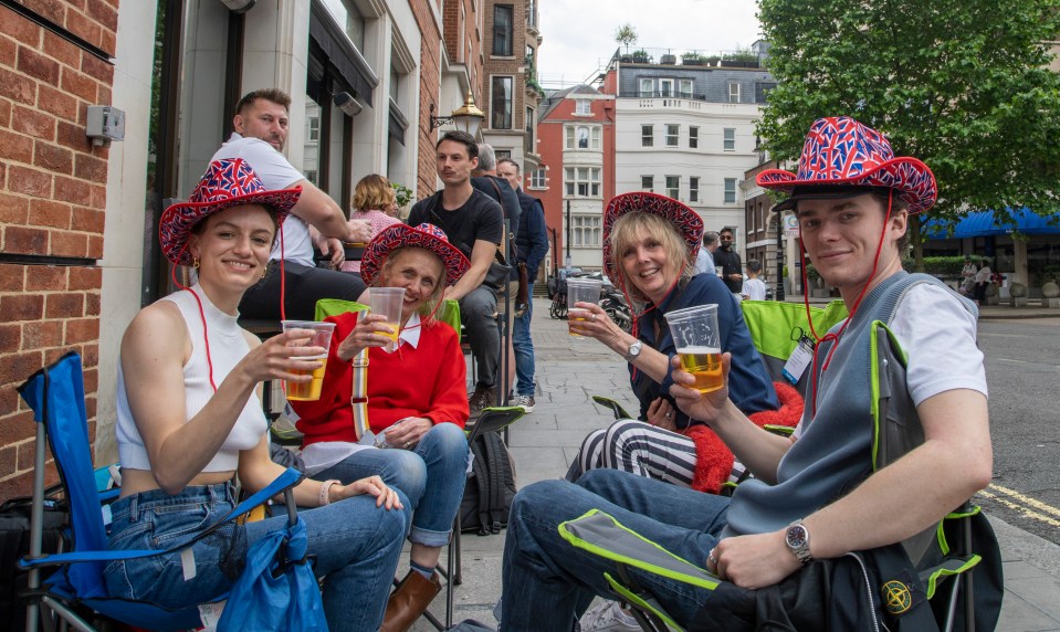 Anna, Alison, Catherine and Ally raise a glass - or plastic cup