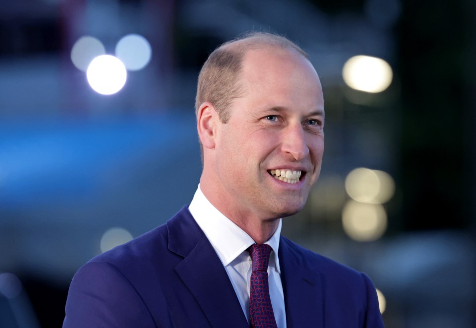 Prince William wore blue as he lit the next beacon at Buckingham Palace