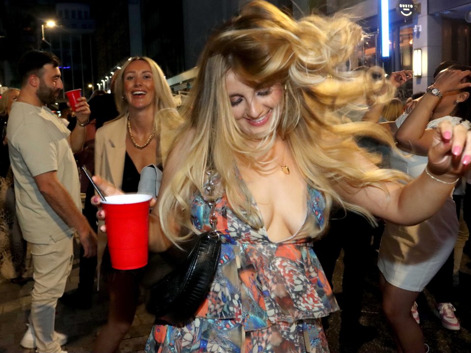 One girl was seen letting her hair down as she drank from a red cup