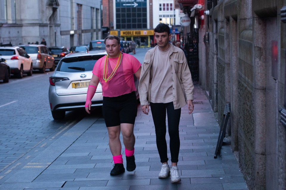 One bloke made sure he was centre of attention in his neon pink get up