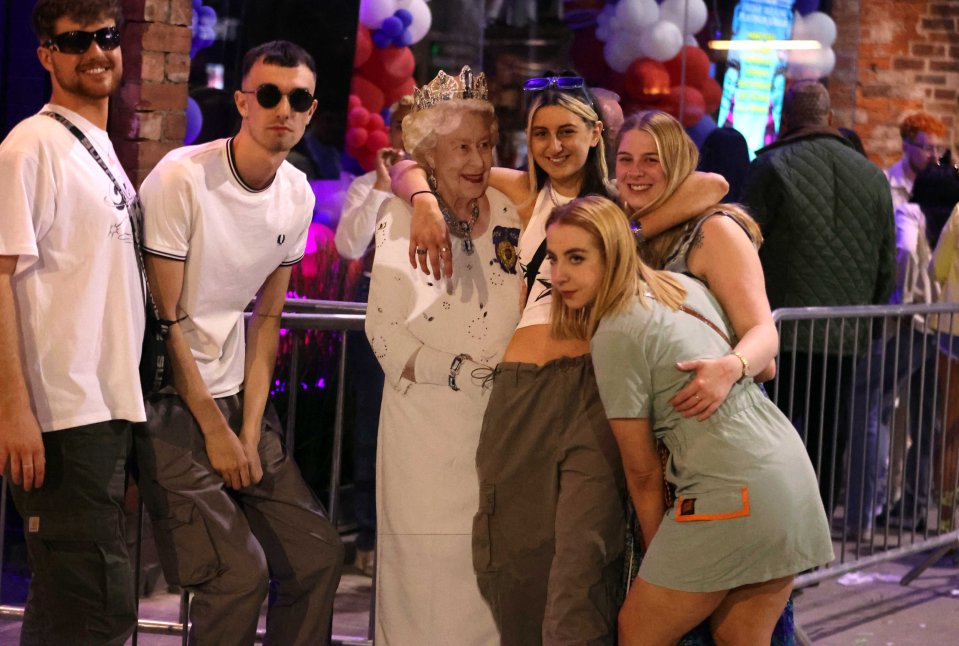 Revellers in Leeds brought a cardboard cutout of the Queen along with them