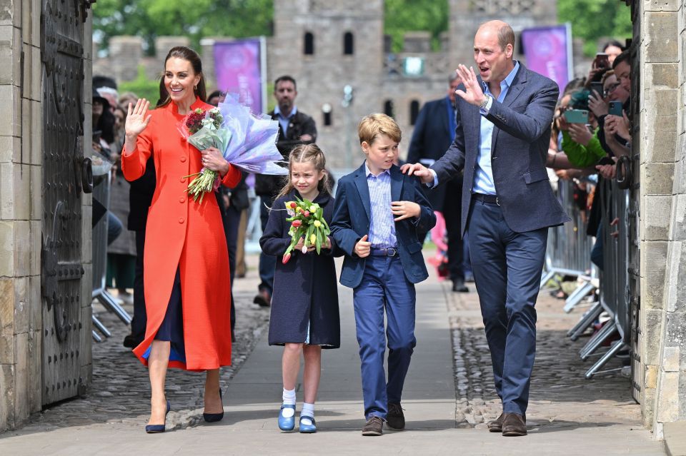 The family were greeted by hundreds of spectators