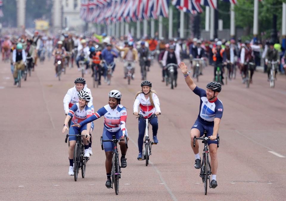 Chris Hoy and members of the Team GB cycling team cycle