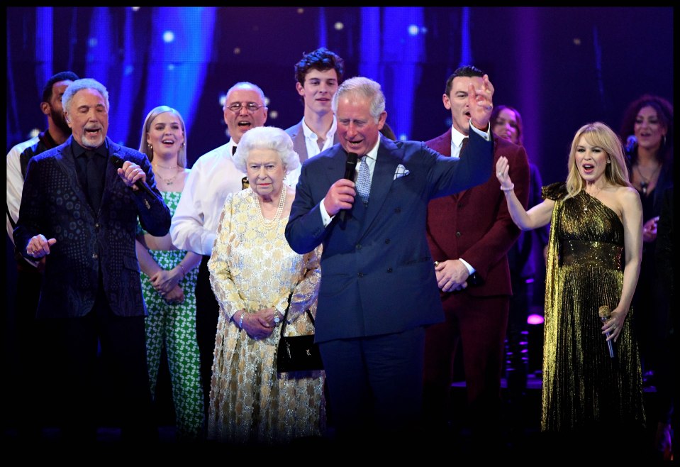 Her Majesty stood beside the heir to the throne as he gave a speech to mark her 92nd birthday at the Royal Albert Hall in 2018