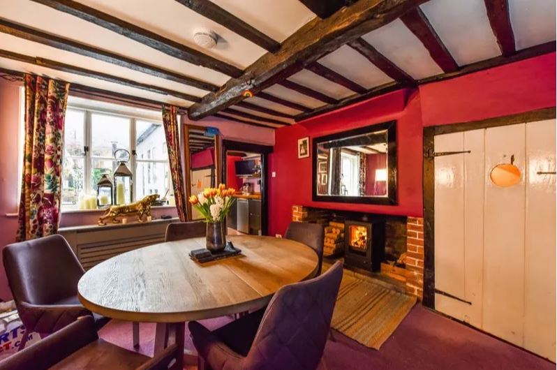 Agents say the town centre home is 'crammed full of period features'