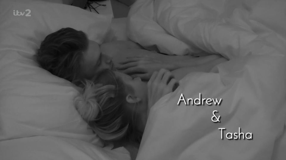 Andrew and Tasha cuddled up in bed