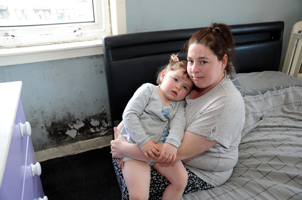 Annemarie Devlin, 32, lives in the damp-riddled home with her two daughters