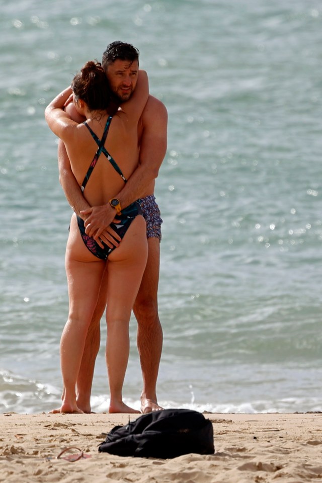 A couple enjoying the weather on Bournemouth beach this morning