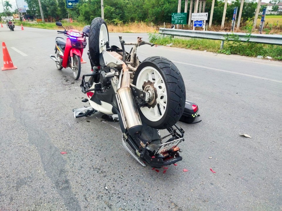 Images show the upturned bike on the motorway following the crash