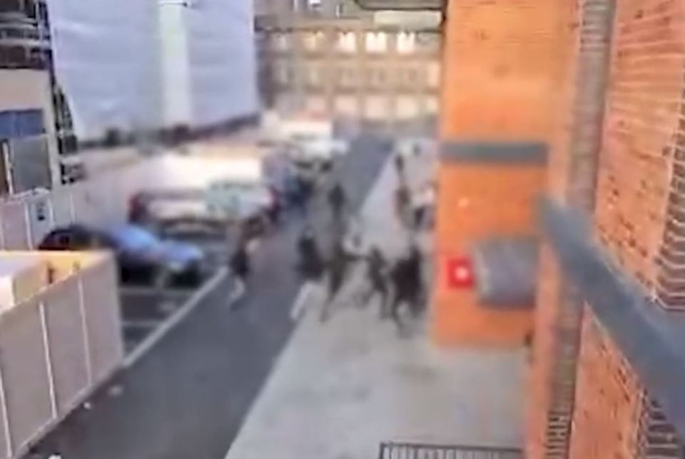 A fight appears to break out between two groups of people before one man is beaten