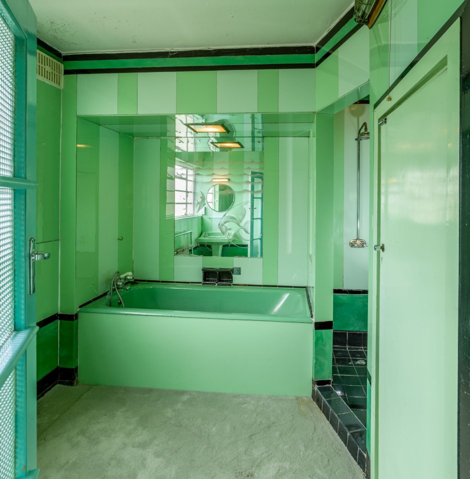 A lime green bathroom is among the bold design choice