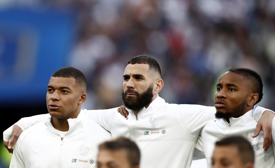 Nkunku (R) alongside superstars Kylian Mbappe (L) and Karim Benzema (C)