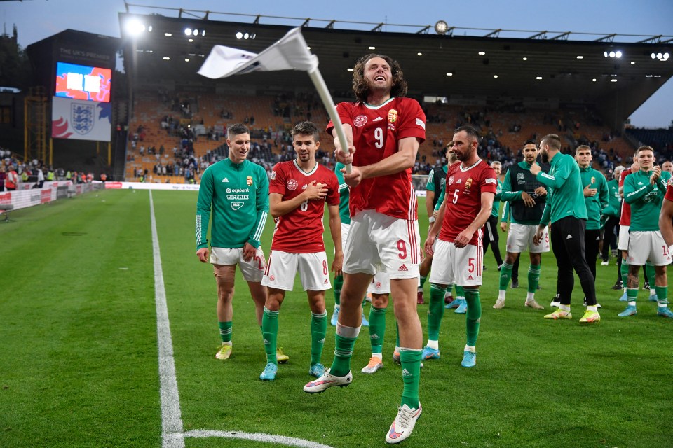 Adam Szalai leads the wild celebrations on a famous night for Hungary