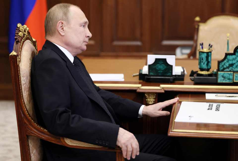 Putin reclines deeply into his chair - is he as ill as the rumours say?