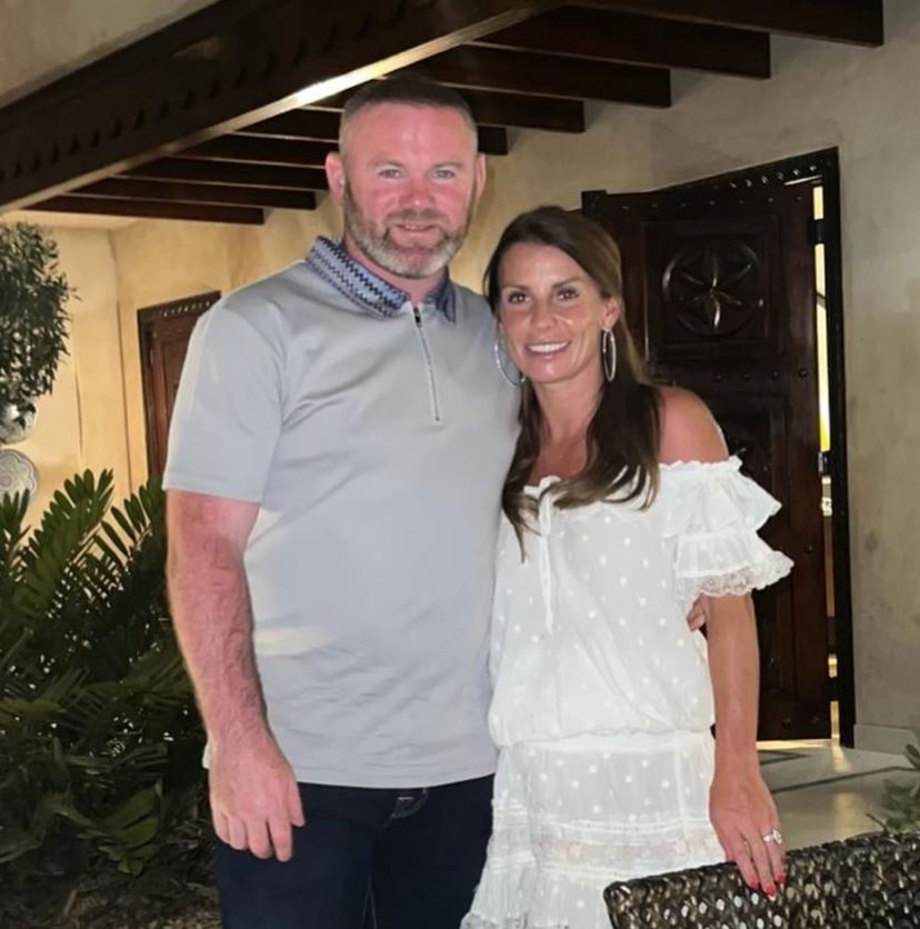 Wayne Rooney hugging wife Coleen in Dubai