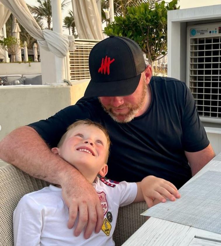 Wayne Rooney sharing sweet snaps with one of his boys