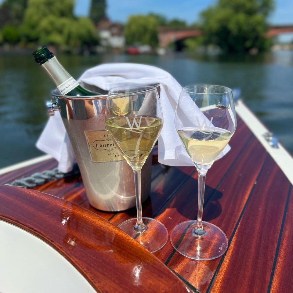 The couple shared a bottle of Laurent Perrier Champagne on their boat trip