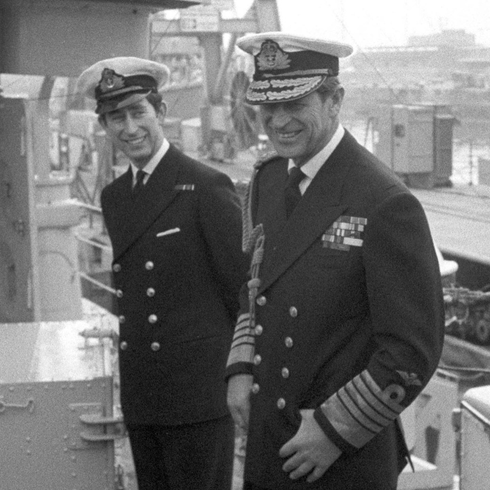 Charles pictured in military uniform with the Duke of Edinburgh