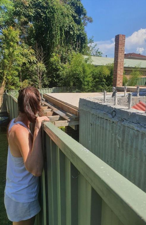 The house's new pool deck would have been level with his 1.8m fence