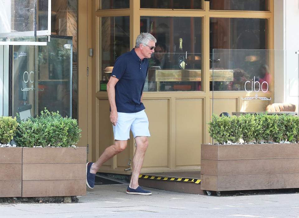 David Gill exits the restaurant