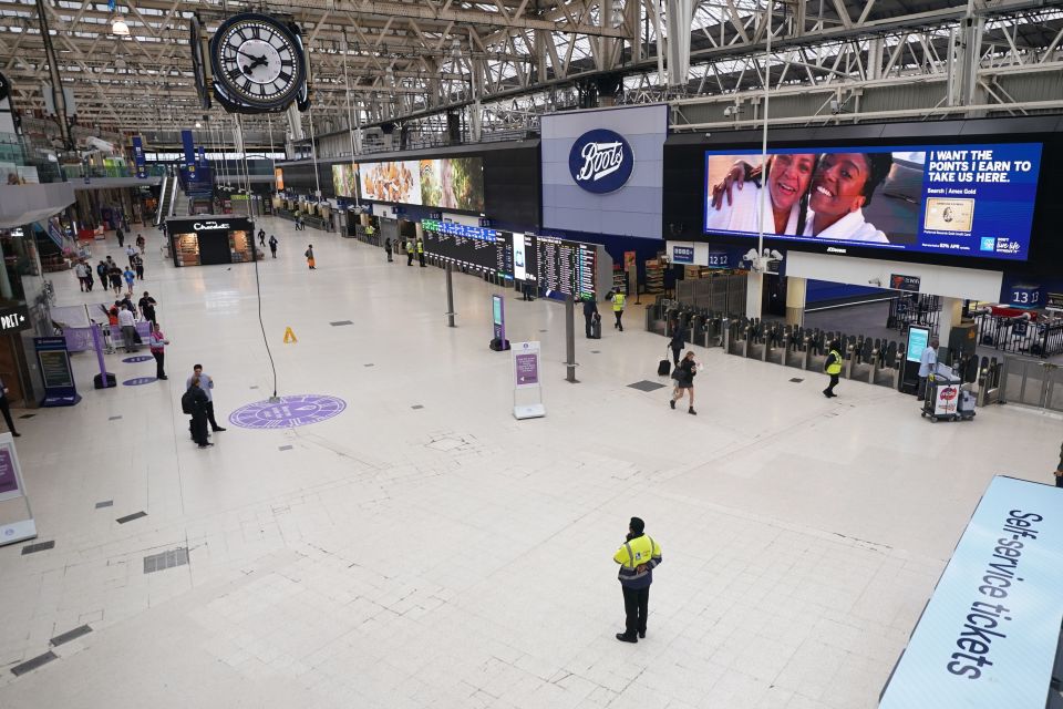 Passengers at Waterloo East station in London, as train services continue to be disrupted