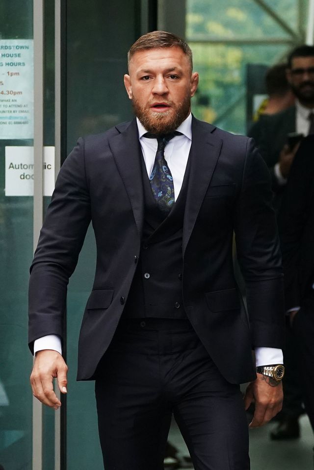 Conor McGregor compared himself to James Bond as he wore a suit to court