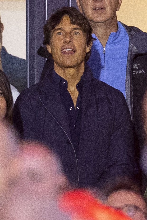 Tom Cruise watched the music legends perform from the American Express VIP zone