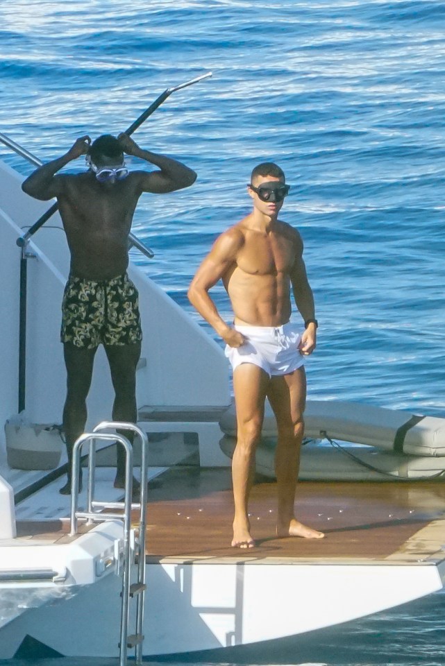 Ronaldo looked serious as he goggled up and prepared to get into the sea