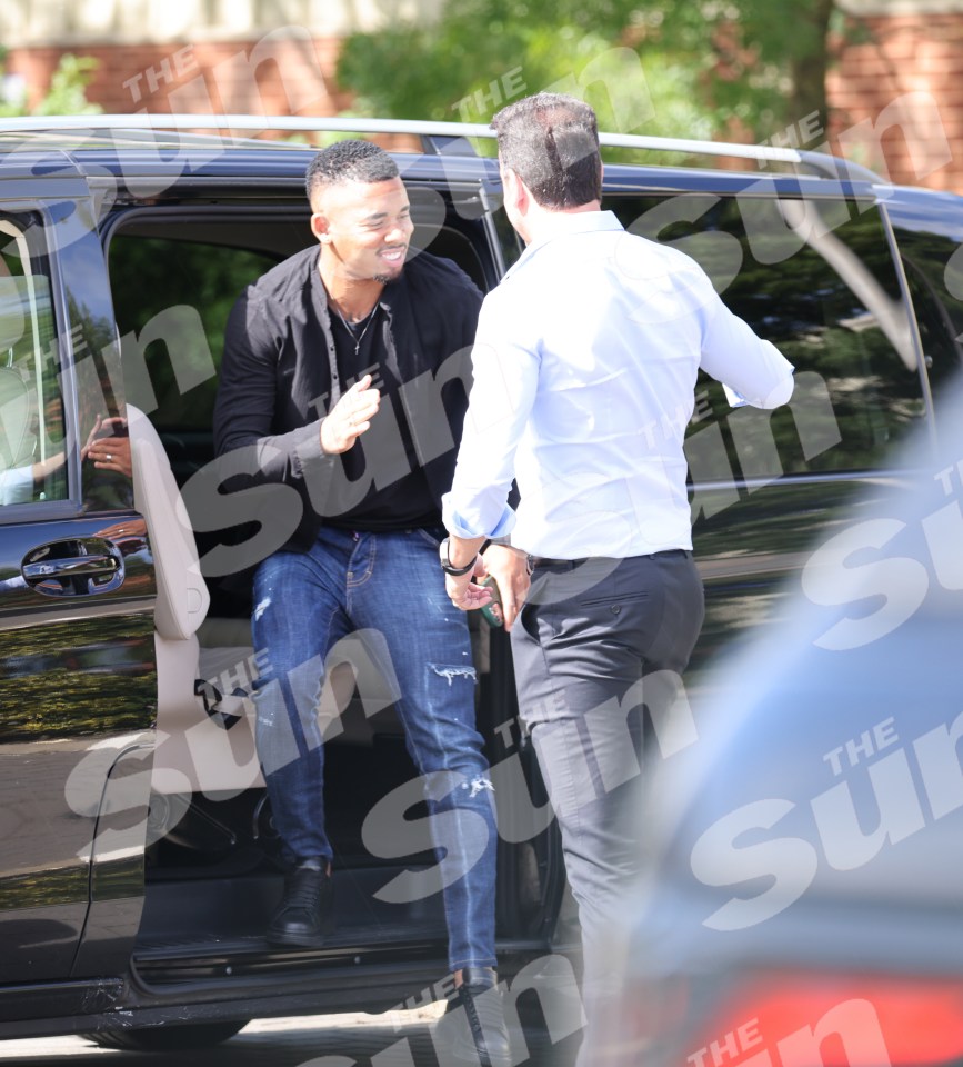 Gabriel Jesus is greeted by Edu as he arrives to undergo his Arsenal medical