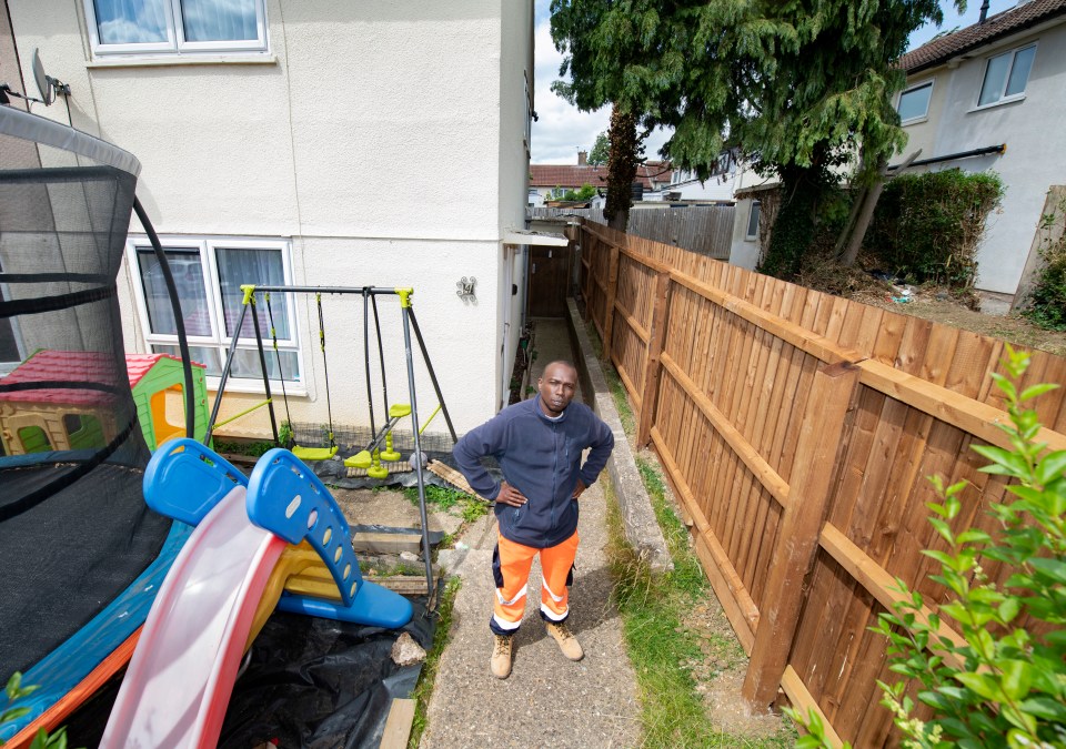 The neighbours erected a wooden fence to block Paul's access to the garden