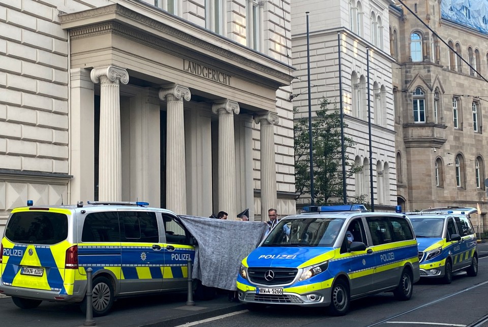 A suspected killer laid a severed head outside this courthouse in Bonn