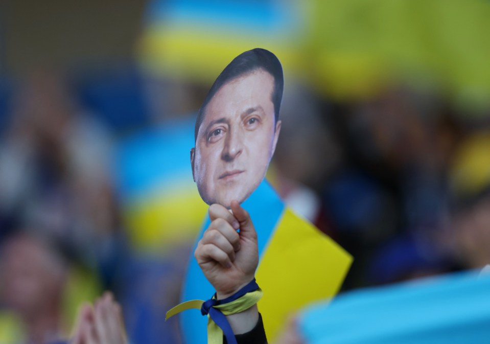 Fans held up Zelensky masks as they supported Ukraine against Scotland