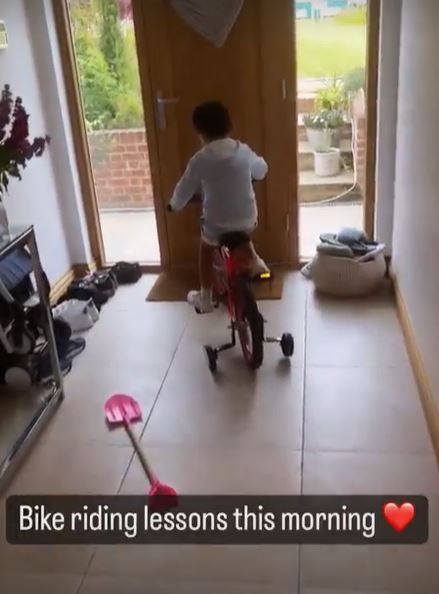 Gemma is helping step-son Tristan learn how to ride a bike