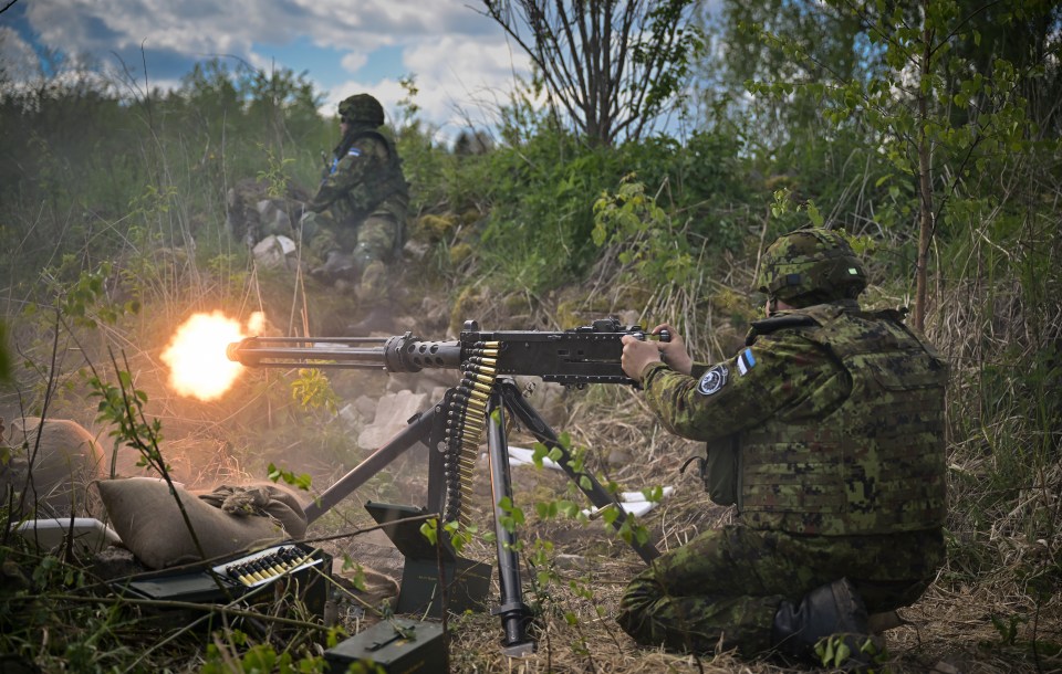 Soldiers from Royal Welsh Battlegroup take part in manouevres during NATO exercise Hedgehog on the Estonian-Latvian border on May 25, 2022