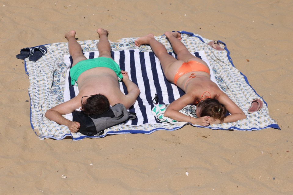 Millions of workers are expected to shun offices and factories on Monday and Tuesday (pictured: sunbathers in Margate)