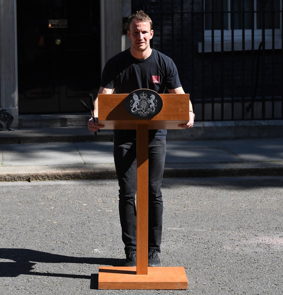 Brits were quick to notice that he is the SAME man that set up the podium for Mr Johnson's predecessor Theresa May