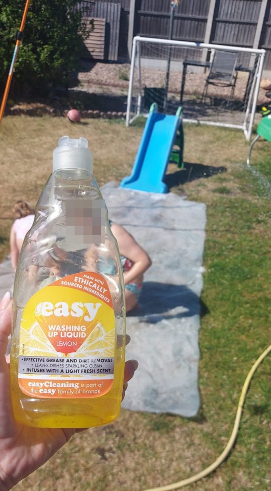 A mum has shared a clever way of creating a slip and slide for free this summer